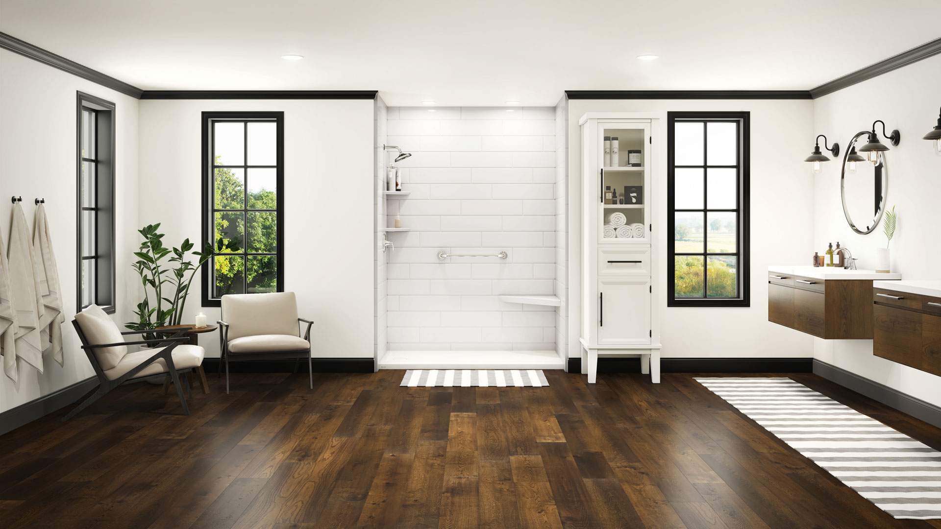 A large bathroom with dark wood flooring, two chairs, and a walk-in shower with white tile walls.