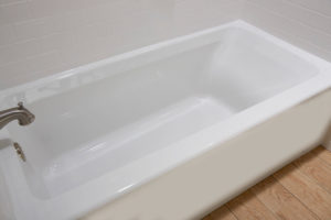 A close-up image of a white bathtub.