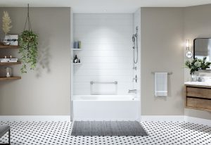 White Bathtub with gray walls.