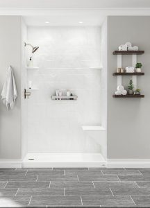 Bathroom showing gray walls with white tiles.